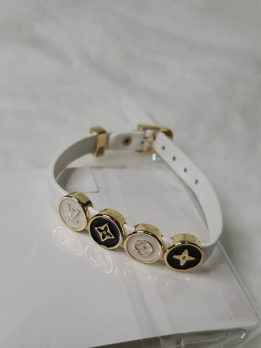 White  Bracelet with Gold and Black Monogram Discs